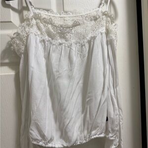 Brand new hollister lace blouse. Size sticker still on